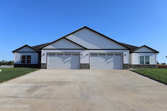838 Otter Creek Rd, Vine Grove, KY 40175 - view of front of property with stone siding, an attached garage, driveway, and a front yard