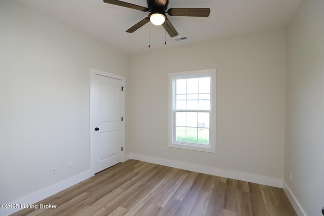 838 Otter Creek Rd, Vine Grove, KY 40175 - spare room featuring wood finished floors and ceiling fan
