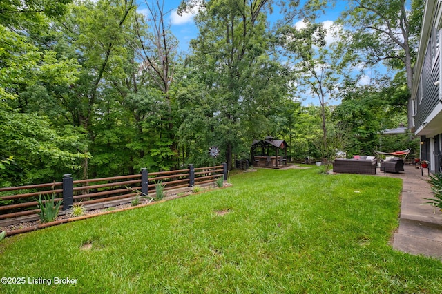 8504 Bambi Way, Louisville, KY 40214 - fenced backyard with an outdoor living space, a gazebo, and a patio