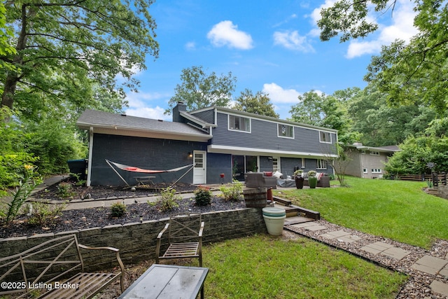 8504 Bambi Way, Louisville, KY 40214 - view of front of home with a front lawn and a chimney