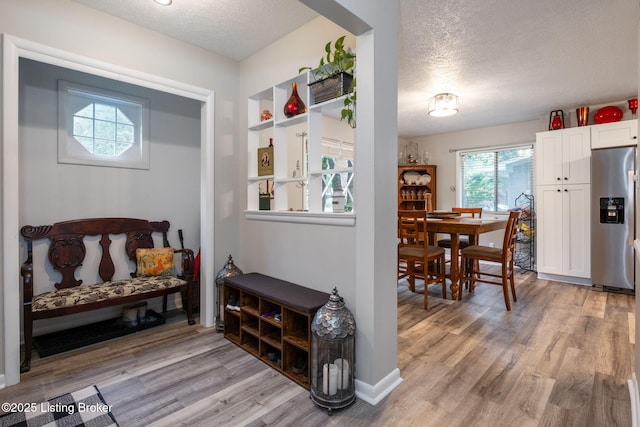 8504 Bambi Way, Louisville, KY 40214 - mudroom featuring a textured ceiling and light wood-type flooring