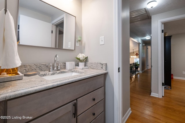 8504 Bambi Way, Louisville, KY 40214 - bathroom with wood finished floors and vanity