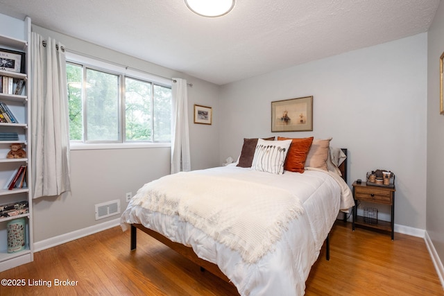 8504 Bambi Way, Louisville, KY 40214 - bedroom with light wood-style flooring and baseboards