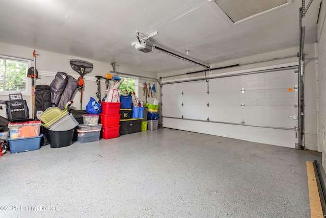 8504 Bambi Way, Louisville, KY 40214 - garage featuring a garage door opener