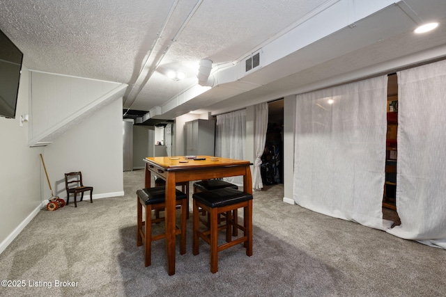 8504 Bambi Way, Louisville, KY 40214 - dining space featuring carpet flooring and a textured ceiling