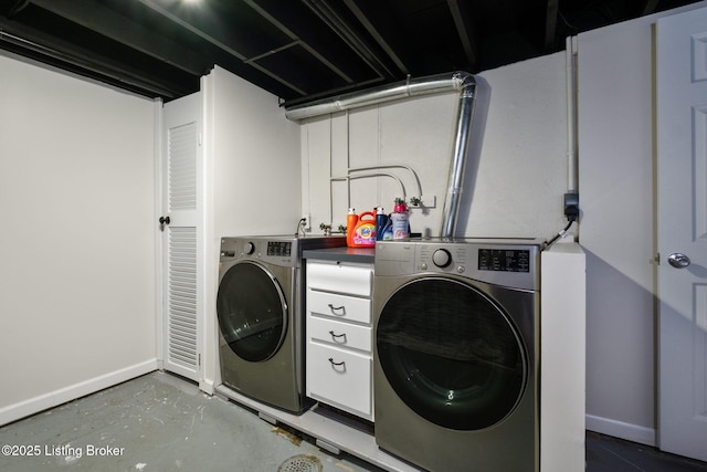 8504 Bambi Way, Louisville, KY 40214 - washroom featuring washing machine and clothes dryer and baseboards