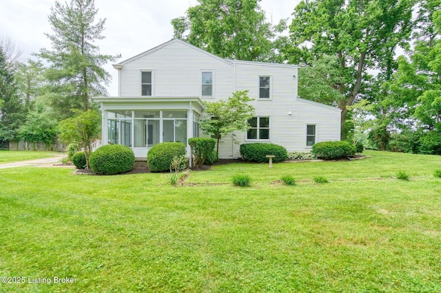 6301 Innisbrook Dr, Prospect, KY 40059 - rear view of property featuring a sunroom and a lawn
