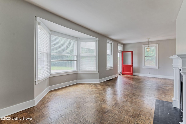 6301 Innisbrook Dr, Prospect, KY 40059 - unfurnished living room featuring baseboards