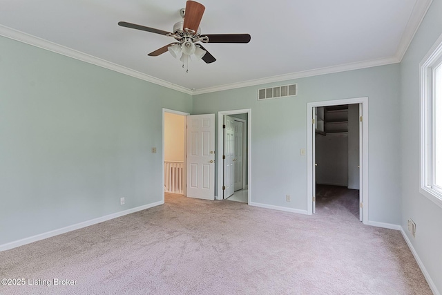 6301 Innisbrook Dr, Prospect, KY 40059 - unfurnished bedroom featuring carpet, crown molding, a spacious closet, multiple windows, and a ceiling fan
