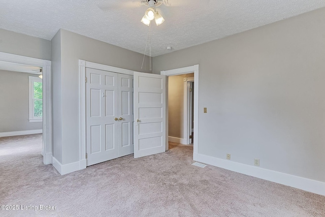 6301 Innisbrook Dr, Prospect, KY 40059 - unfurnished bedroom with carpet floors, a textured ceiling, a closet, and ceiling fan