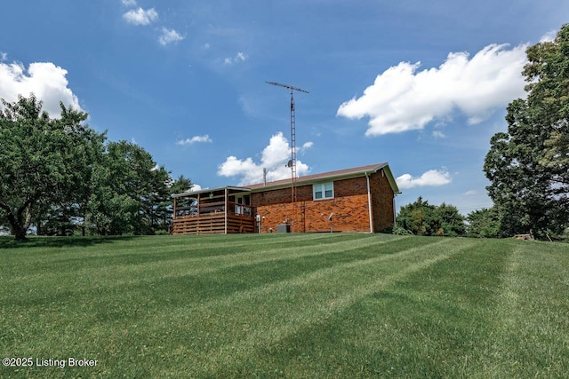 2149 Shrewsbury Rd, Leitchfield, KY 42754 - back of house with a lawn and brick siding
