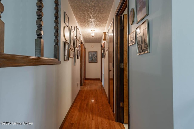 2149 Shrewsbury Rd, Leitchfield, KY 42754 - hallway featuring a textured ceiling and wood finished floors