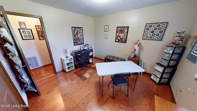 2149 Shrewsbury Rd, Leitchfield, KY 42754 - office area featuring light wood-style flooring and a textured ceiling