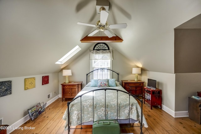 3119 Bobolink Rd, Louisville, KY 40213 - bedroom with a skylight, hardwood / wood-style floors, lofted ceiling, and a ceiling fan
