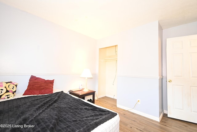 119 E Blue Jay Rd, Louisville, KY 40229 - bedroom featuring light wood-style flooring and baseboards