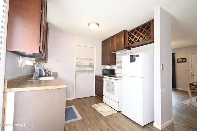 119 E Blue Jay Rd, Louisville, KY 40229 - kitchen with white appliances, light wood-style flooring, and light countertops