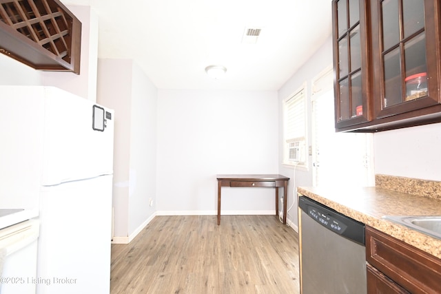 119 E Blue Jay Rd, Louisville, KY 40229 - kitchen featuring dishwasher, light wood finished floors, freestanding refrigerator, glass insert cabinets, and light countertops