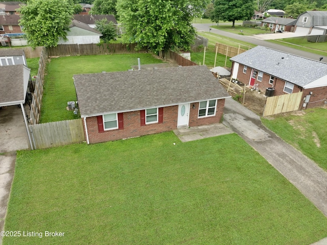 119 E Blue Jay Rd, Louisville, KY 40229 - view of front of property with brick siding, a shingled roof, a residential view, and driveway