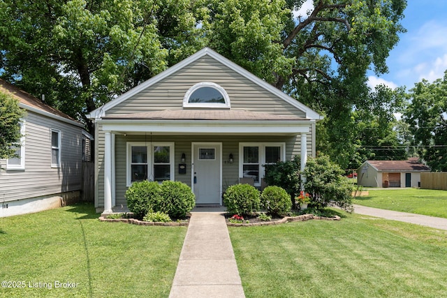 835 Forrest St, Louisville, KY 40217 - view of front of home featuring a front yard and covered porch