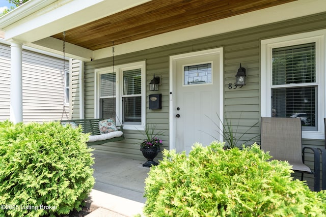 835 Forrest St, Louisville, KY 40217 - doorway to property with a porch