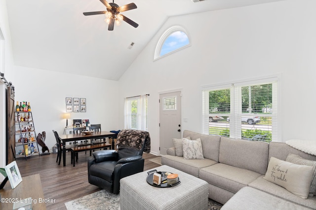 835 Forrest St, Louisville, KY 40217 - living room featuring high vaulted ceiling, wood finished floors, and a ceiling fan