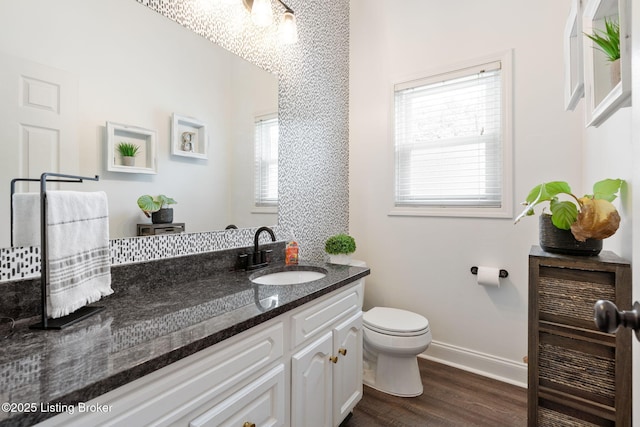 835 Forrest St, Louisville, KY 40217 - bathroom featuring vanity and wood finished floors