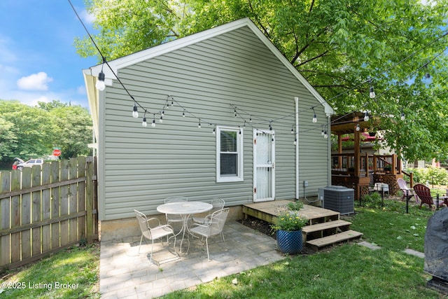 835 Forrest St, Louisville, KY 40217 - rear view of house with a wooden deck and a patio area