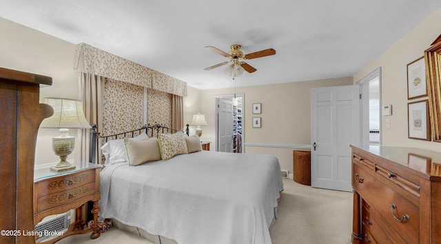 3615 Hycliffe Ave, Louisville, KY 40207 - bedroom with light carpet, a walk in closet, a ceiling fan, and a closet