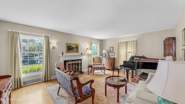 3615 Hycliffe Ave, Louisville, KY 40207 - living room with light wood finished floors and a premium fireplace