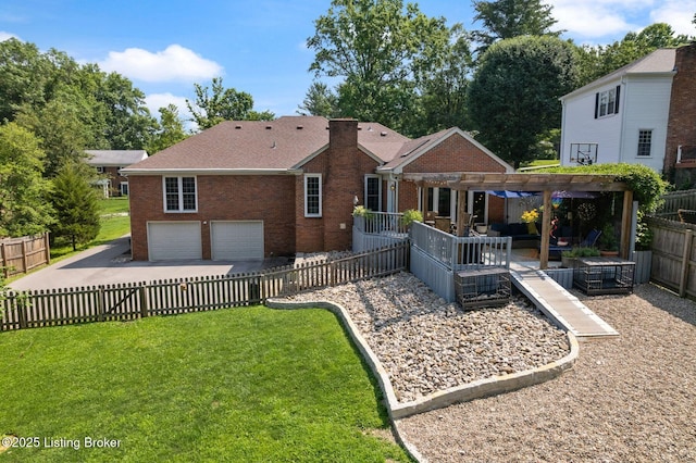 7104 Fox Harbor Rd, Prospect, KY 40059 - rear view of house featuring brick siding, a garage, a pergola, outdoor lounge area, and a fenced backyard