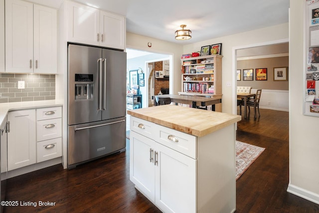 7104 Fox Harbor Rd, Prospect, KY 40059 - kitchen featuring high end fridge, wood counters, dark wood-type flooring, and backsplash