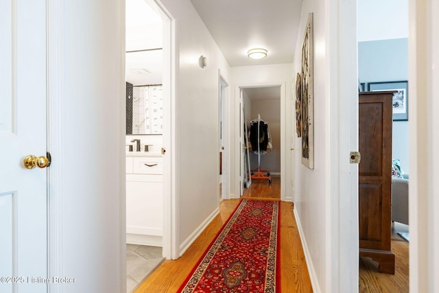 7104 Fox Harbor Rd, Prospect, KY 40059 - hallway with light wood-style floors
