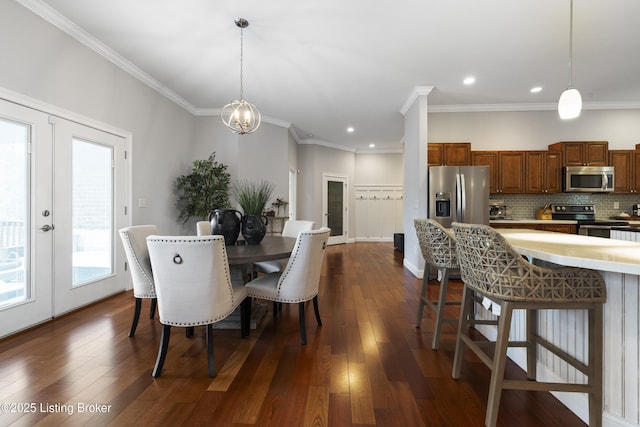 6103 Winkler Rd, Crestwood, KY 40014 - dining area featuring dark wood-style floors, ornamental molding, french doors, recessed lighting, and a chandelier
