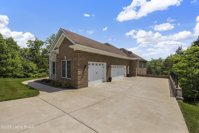 6103 Winkler Rd, Crestwood, KY 40014 - view of side of home featuring driveway, brick siding, a garage, and a yard