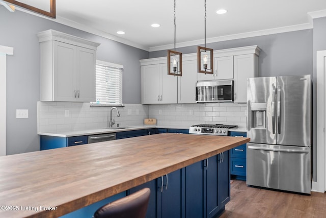 4066 Firestone Way, Shelbyville, KY 40065 - kitchen with stainless steel appliances, wooden counters, blue cabinetry, crown molding, and recessed lighting