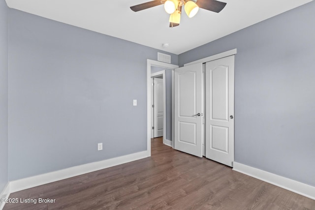 4066 Firestone Way, Shelbyville, KY 40065 - unfurnished bedroom with wood finished floors, a closet, and a ceiling fan
