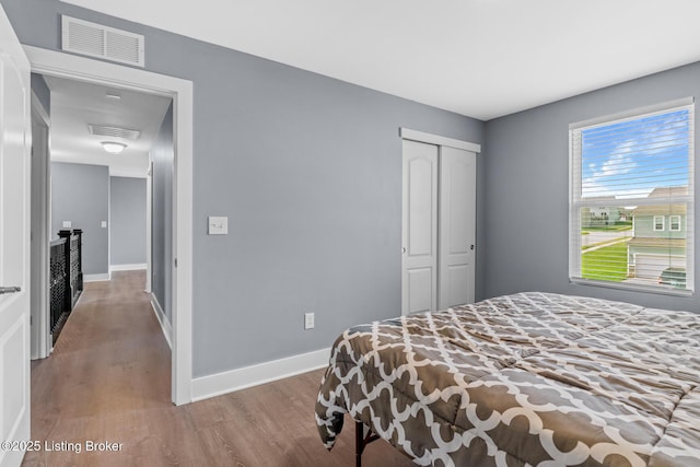 4066 Firestone Way, Shelbyville, KY 40065 - bedroom with wood finished floors and a closet
