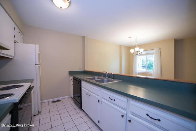 37 Lake Ave, Louisville, KY 40206 - kitchen with dishwasher, electric range oven, a chandelier, dark countertops, and white cabinets