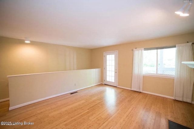 37 Lake Ave, Louisville, KY 40206 - empty room with wood finished floors and baseboards