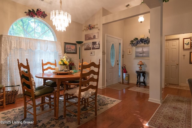 115 Canewood Blvd, Georgetown, KY 40324 - dining space with wood finished floors, high vaulted ceiling, and a chandelier
