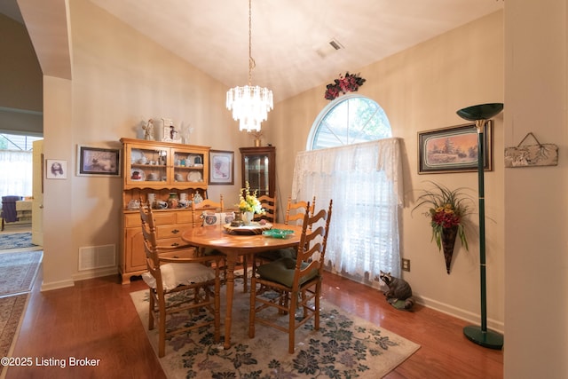 115 Canewood Blvd, Georgetown, KY 40324 - dining space with wood finished floors, plenty of natural light, a chandelier, and lofted ceiling