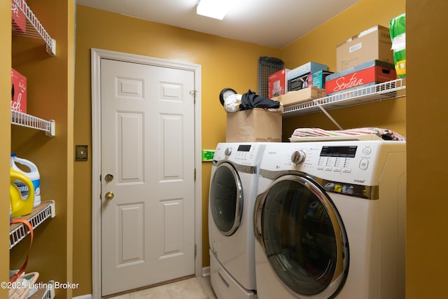 115 Canewood Blvd, Georgetown, KY 40324 - washroom with washing machine and clothes dryer and light tile patterned floors