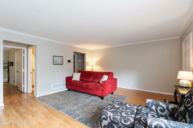 10757 Colonial Woods Ct, Louisville, KY 40023 - living room with wood finished floors and crown molding