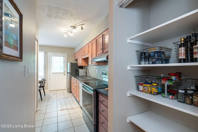 10757 Colonial Woods Ct, Louisville, KY 40023 - kitchen featuring stainless steel range with electric stovetop, under cabinet range hood, light tile patterned floors, dark countertops, and a textured ceiling