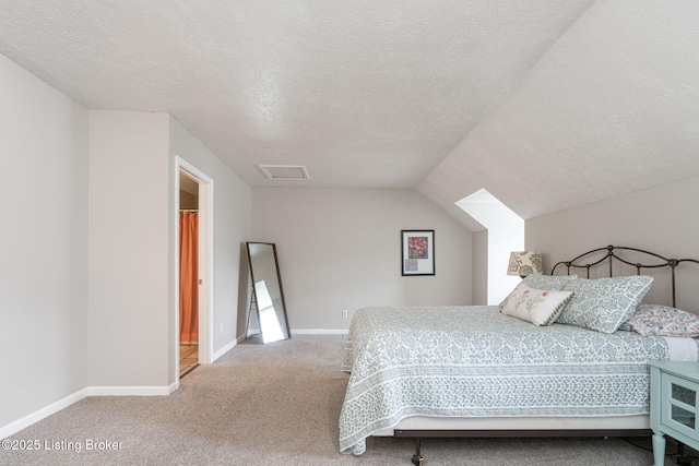 10757 Colonial Woods Ct, Louisville, KY 40023 - carpeted bedroom featuring a textured ceiling and lofted ceiling