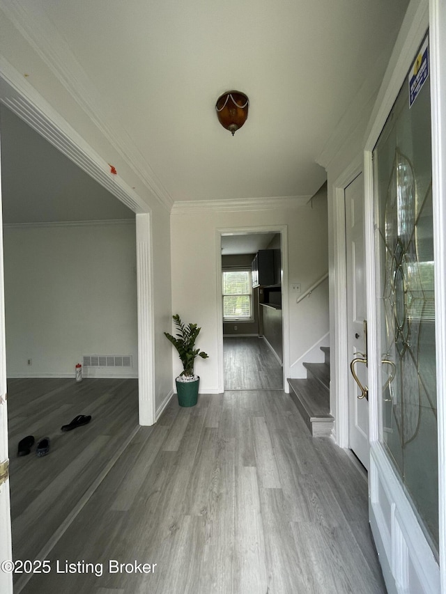 402 Bromwell Dr, Louisville, KY 40245 - hallway with stairs, wood finished floors, and crown molding