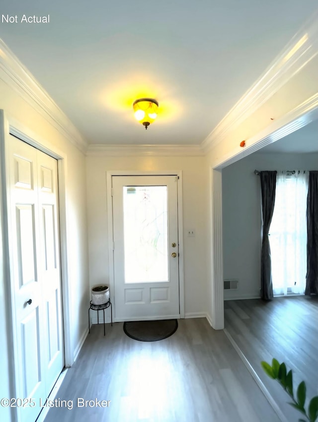 402 Bromwell Dr, Louisville, KY 40245 - entryway featuring wood finished floors and ornamental molding