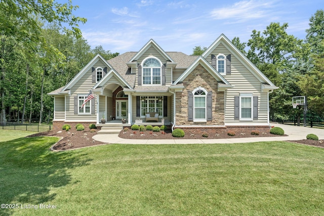 3707 Sumerlin Dr, Buckner, KY 40010 - craftsman house with covered porch, a shingled roof, and stone siding