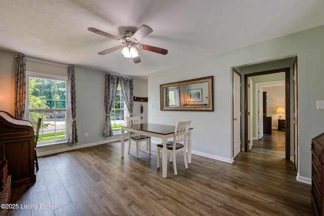 11208 Hasbrook Ct, Louisville, KY 40229 - dining area with ceiling fan, dark wood-style flooring, and a textured ceiling