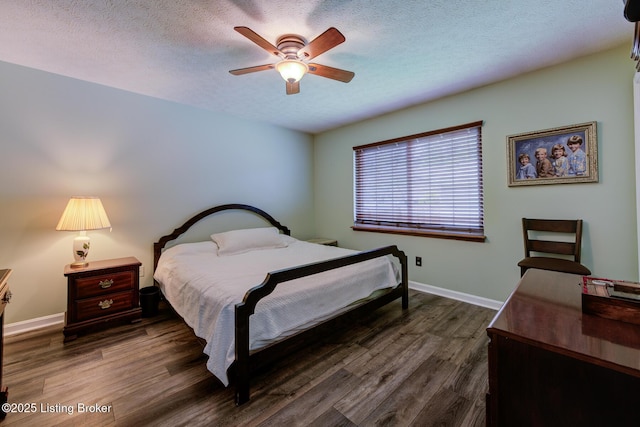 11208 Hasbrook Ct, Louisville, KY 40229 - bedroom featuring dark wood-style floors, a textured ceiling, and a ceiling fan